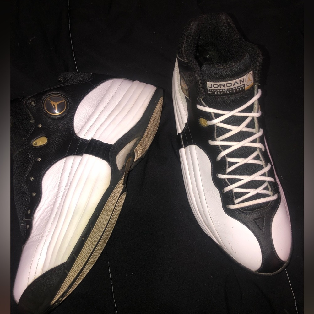 Jordans jumpman team 1 black white and gokd